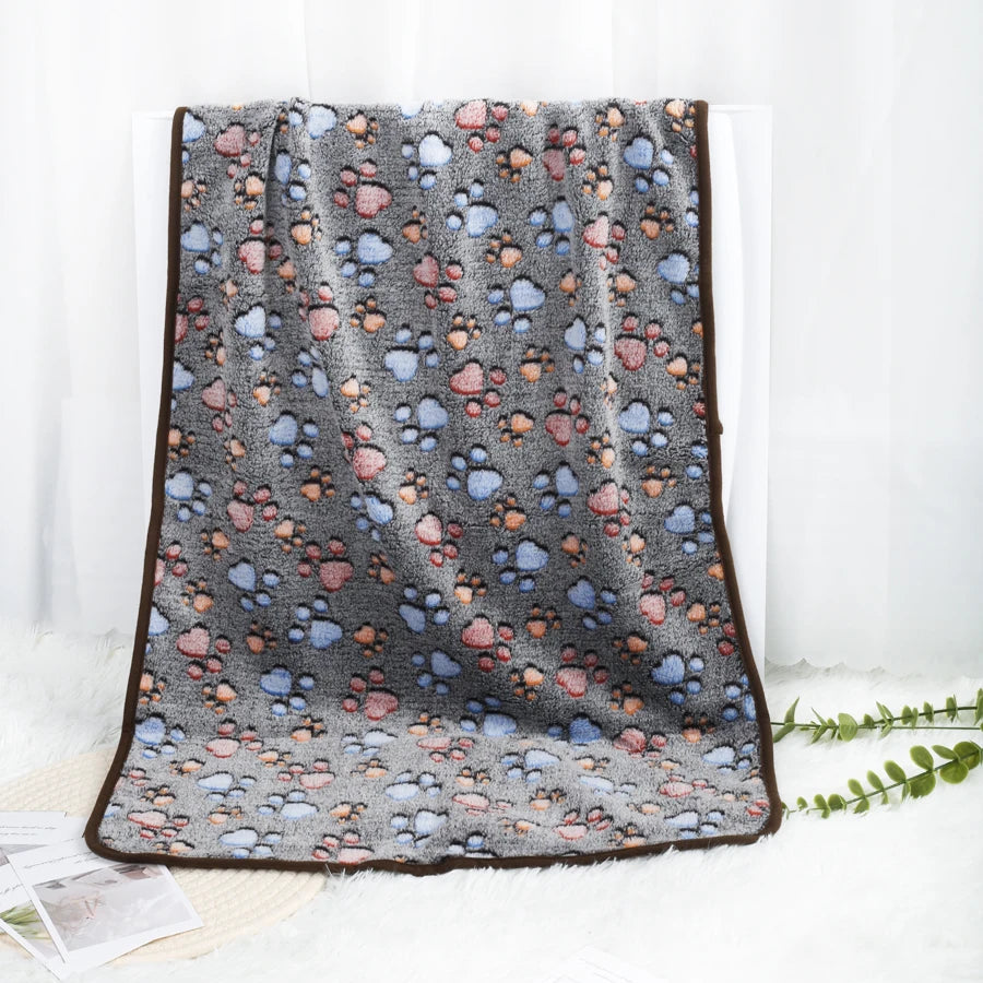 Soft Fleece Pet Blanket — Warm Paw Print Blanket for Dogs & Cats — detail close-up