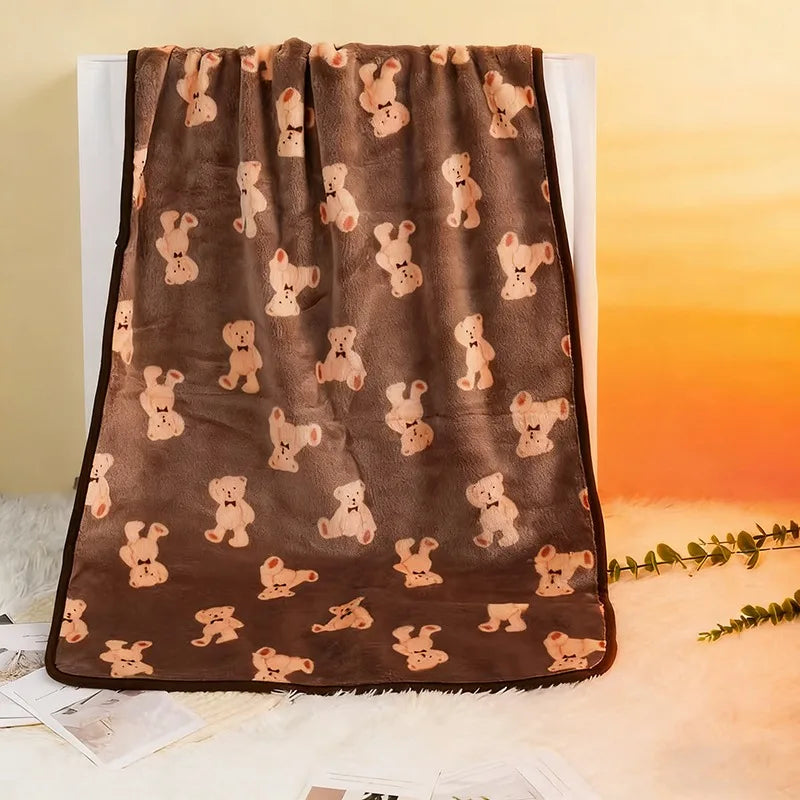 Soft Fleece Pet Blanket — Warm Paw Print Blanket for Dogs & Cats shown in use